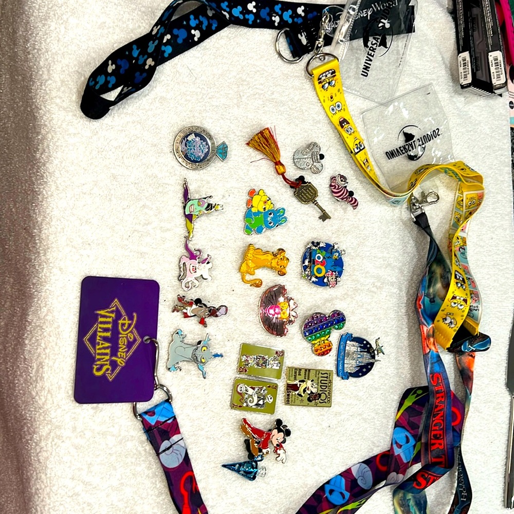 NWOT Disney bundle of 4 lanyards and 18 pins.